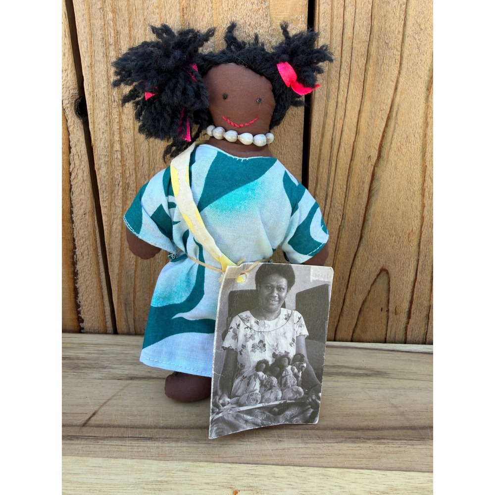 Handmade Fijian cloth doll, wearing a green and white batik dress - Picture 2 of 5